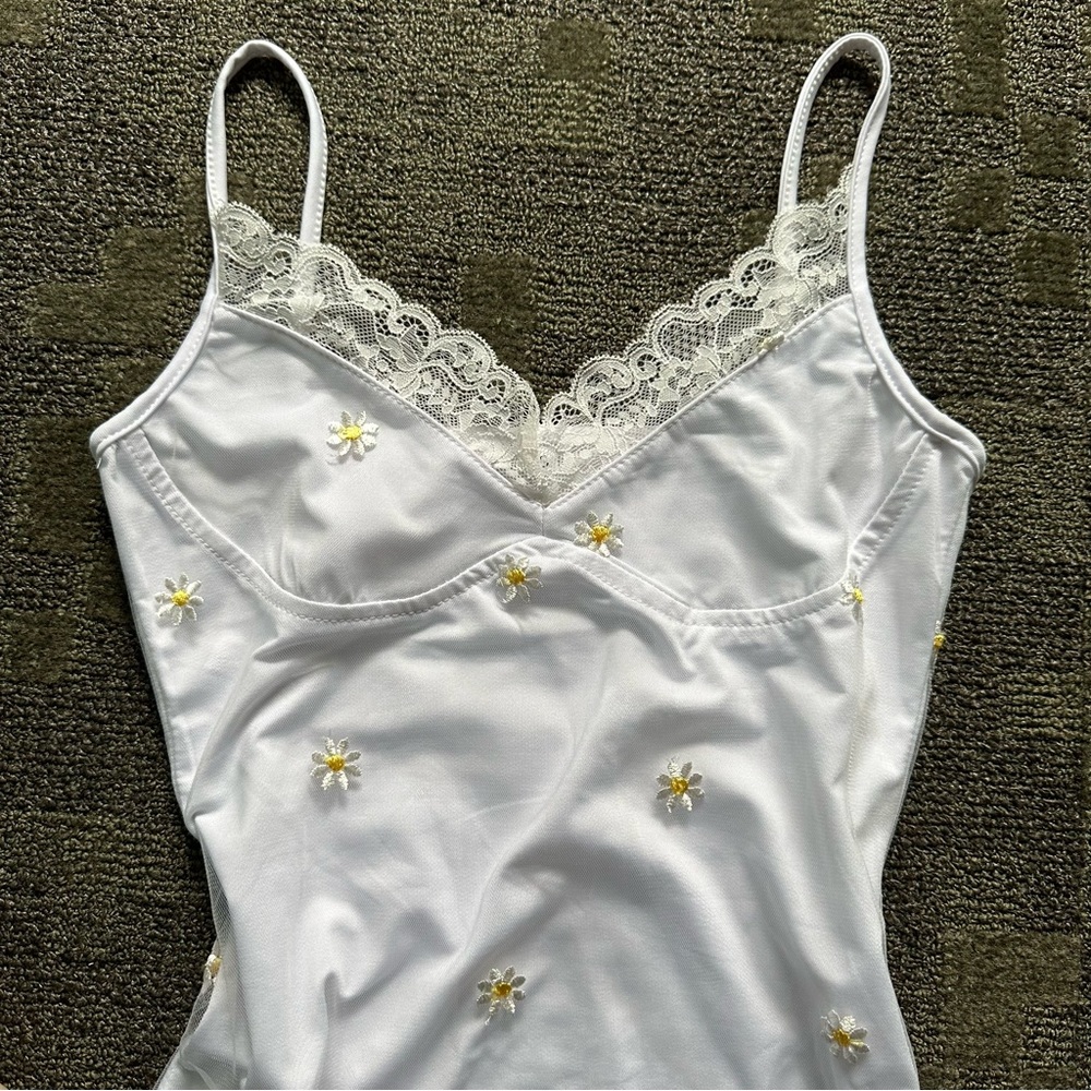white mini dress with daisies